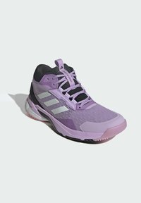 Purple athletic shoe with black accents, featuring a textured upper, three white stripes, and a rubber sole with pink details.