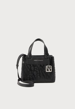 Black handbag made from textured material, featuring embossed logo, dual handles, detachable shoulder strap, and a silver brand tag.