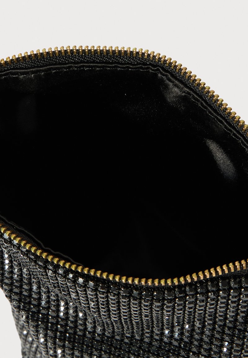 Black pouch bag with metallic rhinestones, featuring a smooth velvet interior and a gold zipper. Textured surface with a shiny finish.