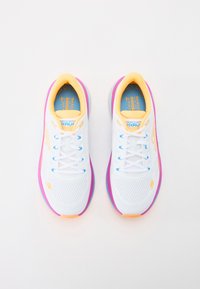 White athletic shoes with a breathable mesh upper, yellow accents, blue laces, and a purple-pink sole. Contoured and padded collar design.