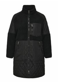 Black jacket featuring a mix of textured fleece and quilted fabric. Full zip closure, high collar, and multiple zippered pockets.