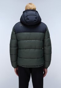 Green and navy puffer jacket with a quilted design, featuring a large hood and zipper closure. Textured fabric and bold color blocking.