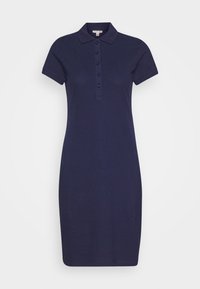 Vestido polo de color marino con cuello, mangas cortas y tapeta de botones. Tejido suave con una silueta ajustada, que llega a medio muslo. Sin patrones ni detalles.