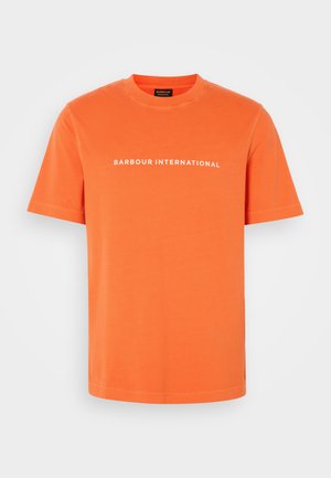 Orange cotton t-shirt with a round neckline and short sleeves. Features white text reading "BARBOUR INTERNATIONAL" across the chest.