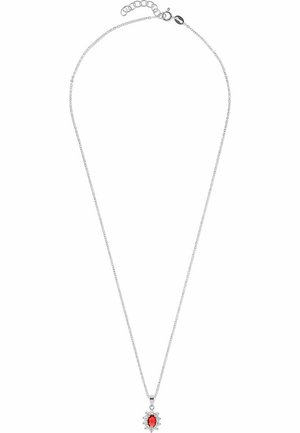 Silver chain necklace featuring an oval red gemstone pendant surrounded by small clear gemstones. Delicate link design with a clasp.