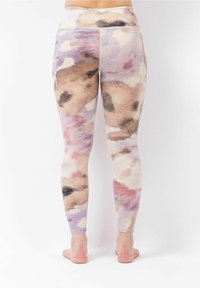Leggings made of soft, stretchy fabric featuring a multicolored watercolor pattern in shades of pink, purple, and beige with a high waistband.