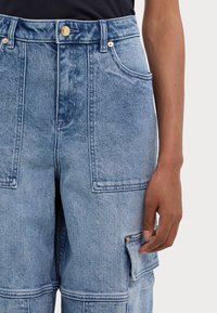 MICHAEL Michael Kors MID RISE  - Široke hlačnice - blue
