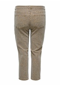 Traperice s uzorkom leoparda, bež pozadina s tamnobrunim mrljama, dizajn s pet džepova, ravne nogavice i detalj ošivene pasice.