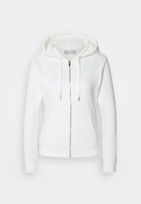 Sweat à capuche blanc zippé avec cordons, poches avant, manches longues et capuche, présenté sur un fond uni.