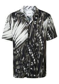 Camicia a maniche corte bianca e nera con un motivo astratto simile a un'ombra e colletto a camicia.