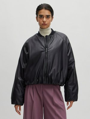EDITED RIKA - Leather jacket - schwarz