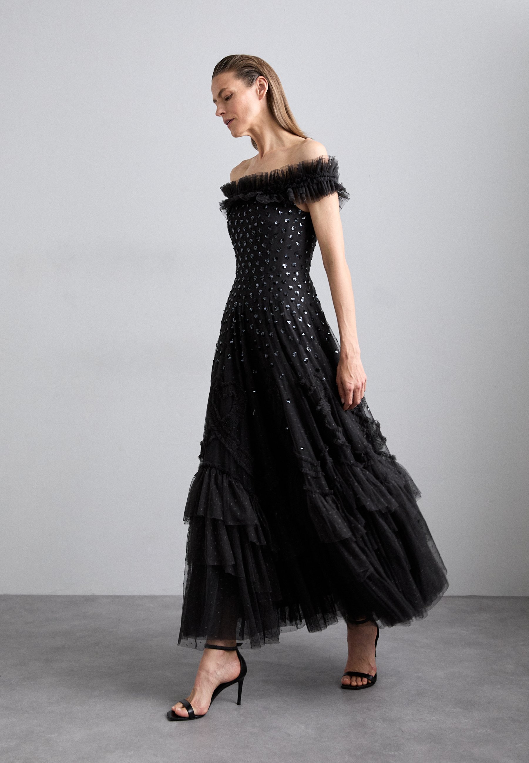 needle and thread black gown