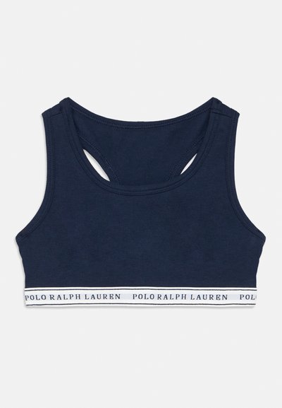 Tengerészkék pamut sportmelltartó kivágott hátrésszel, amelyen fehér és tengerészkék csíkos szalag látható, "POLO RALPH LAUREN" felirattal. Simább textúra.