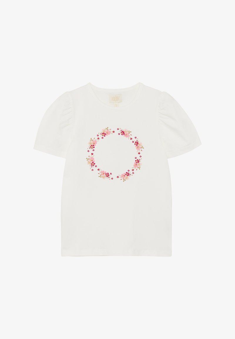 T-shirt en coton blanc avec manches courtes bouffantes et un motif de couronne florale en rose et beige au centre. Texture lisse.