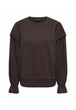 Donkerbruine blouse met lange mouwen met opgeblazen mouwen die bij de polsen zijn samengebonden en een ronde halslijn, getoond op een witte achtergrond.