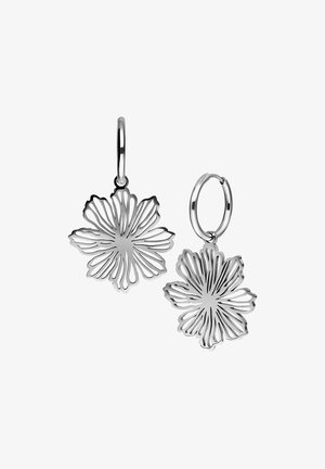 Silver hoop earrings featuring a flower design with intricate cut-out patterns and a polished finish, highlighting their delicate shape and texture.