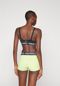 Nike Performance INDY PLUNGE BRA - Sujetadores deportivos con sujeción media - black