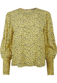 Blusa gialla a maniche lunghe con una vestibilità comoda, caratterizzata da motivi a pois neri, scollatura rotonda e dettagli arricciati ai polsini.