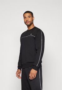 Lacoste Sport - SWEATER TAPE - Sweatshirt - black Thumbnail Image 1