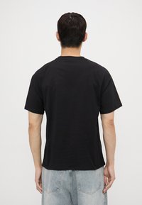 Essential Collective ORGANIC COTTON - Základné tričko - black