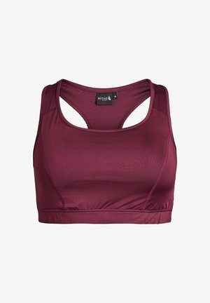 Sujetador deportivo color granate con una textura suave, diseño de espalda cruzada y una banda elástica en la parte inferior. Incluye una etiqueta con la palabra "ACTIVE" y la talla "M".