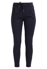 Pantalones joggers de color azul marino, fabricados en un material suave, con una cintura elástica ajustable y pliegues frontales para mayor detalle.