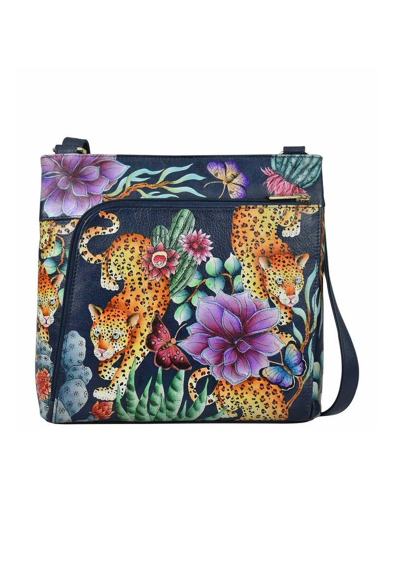 Umhängetasche mit bunten Illustrationen von Leoparden, Schmetterlingen, Kakteen und lila Blumen auf einem dunkelblauen Hintergrund.