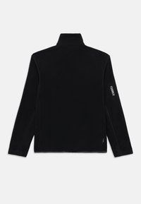 Μαύρο fleece μπουφάν με ψηλό γιακά, μακριά μανίκια και πλαϊνή τσέπη με φερμουάρ. Διαθέτει λευκό κείμενο "TERREX" στο αριστερό μανίκι.