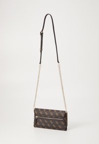 Black patterned crossbody bag with gold accents, featuring a fold-over flap, zip pocket, and chain strap. Textured fabric material.