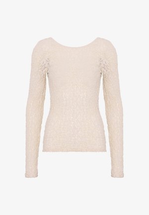 Cămașă cu mânecă lungă în culoarea ivoriului, cu un model floral texturat. Decupaj rotund, siluetă ajustată și material elastic. Finisaj neted și fără închideri.