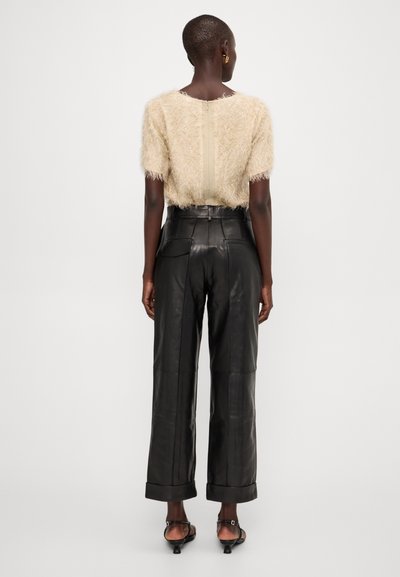 AERON ZIMA PANTS - Leather trousers - black