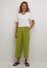 Kaffe DACIA AMBER - Trousers - calla green