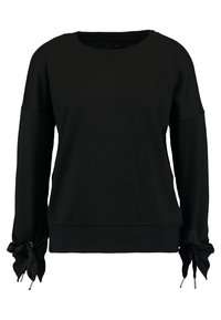 Sudadera negra con mangas largas, presenta puños fruncidos, cordones y un cuello redondo. Fabricada en un suave tejido texturizado.