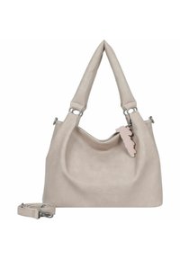 Bolso de mano de piel beige claro con dos asas cortas, correa de hombro ajustable y una etiqueta decorativa rosa. Textura suave, diseño minimalista.
