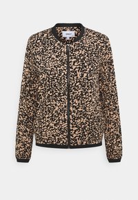 Veste aviateur noire et fauve avec un motif abstrait, poignets, col et ourlet côtelés, avec une fermeture éclair à l'avant. Texture de tissu léger.