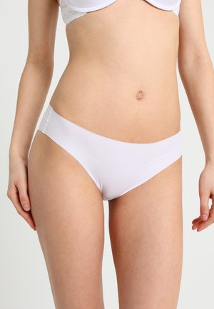White bikini briefs made from smooth, stretchy fabric. Features a low-rise design with a wide waistband and minimal stitching details.