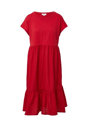 Czerwona bawełniana sukienka z krótkimi rękawami i okrągłym dekoltem. Posiada zgromadzony pas i rozkloszowaną spódnicę z falbaną na końcu.