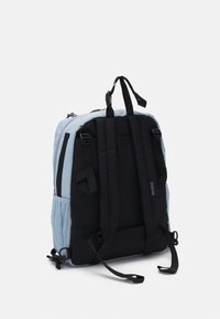 Black and light blue backpack with padded straps, mesh side pocket, and zippered compartments. Durable fabric with a structured design.