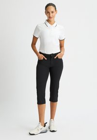 Röhnisch Pantalón 3/4 de deporte - black