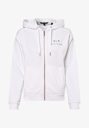 Weißer Kapuzenpullover mit Reißverschluss aus weichem Stoff, mit verstellbarer Kapuze, Fronttaschen, gerippten Bündchen und schwarz gesticktem Logo. Goldener Reißverschlusseinsatz.