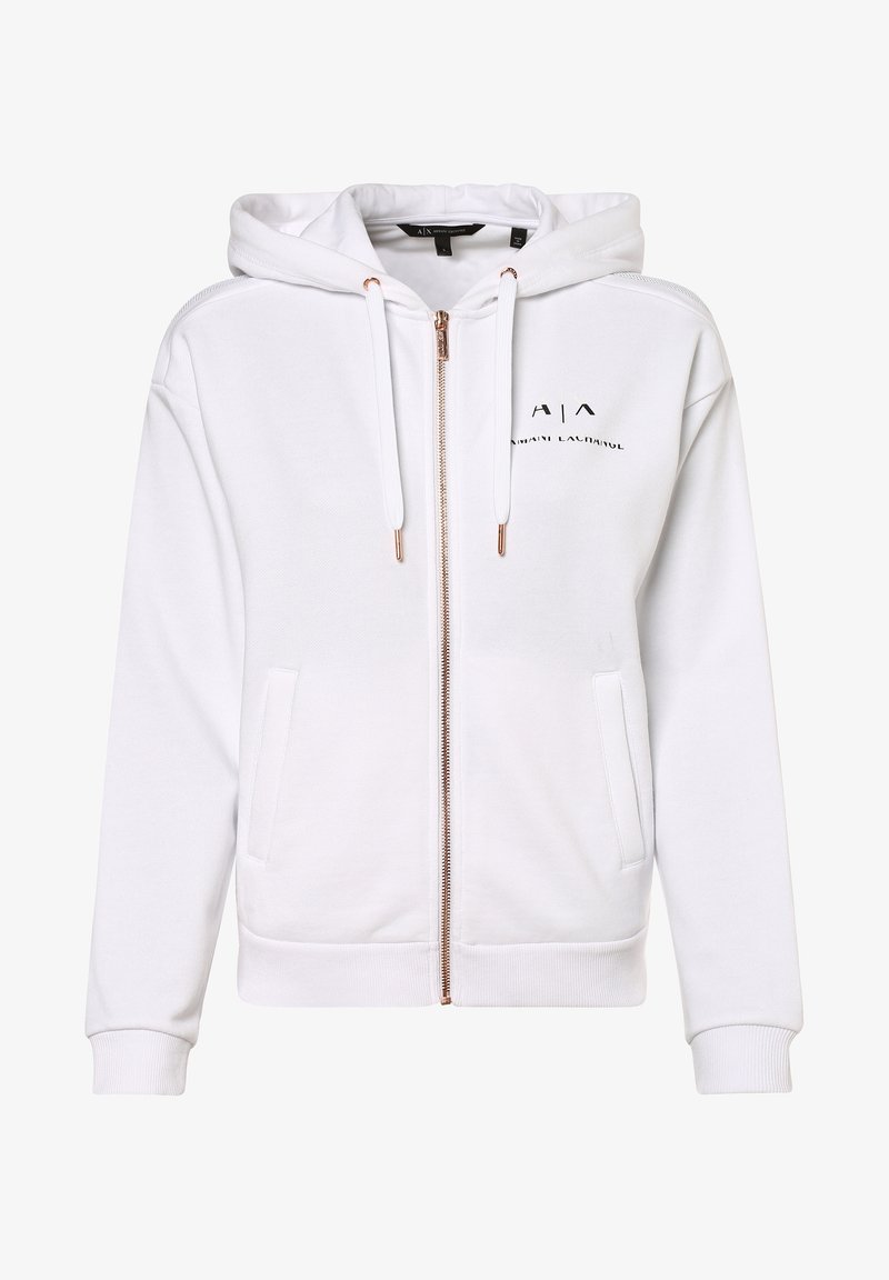 Sweat à capuche blanc à fermeture éclair en tissu doux, avec capuche à cordon de serrage, poches frontales, poignets côtelés et logo brodé en noir. Détail de fermeture éclair dorée.