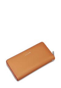 Tan leather wallet with a smooth texture, featuring a silver zipper and embossed "VUCH" logo on the front. Rectangular design, minimalistic style.