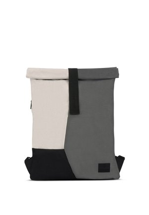 Roll-top backpack with a blend of light gray, dark gray, and black fabric sections. Features a sturdy black strap and a small logo tag.