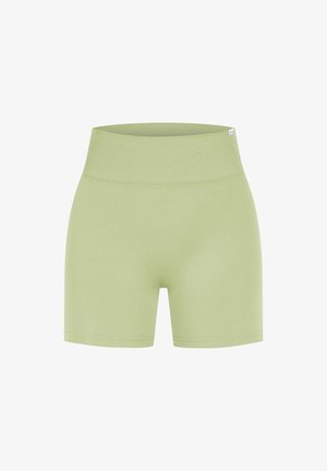 Pantalones cortos de tejido ligero y elástico en verde claro, con una amplia cinturilla acanalada. Textura suave y ajuste entallado, aptos para ropa deportiva.
