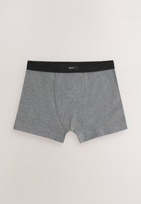 Boxers gris en coton avec une ceinture élastique noire, dotés d'une poche frontale et d'une texture lisse. L'étiquette indique "NEXT".