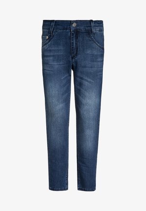 Jean slim bleu foncé avec bouton sur le devant et poches, comprenant des détails subtils d'estompage et de couture sur fond blanc.