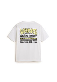 Bílý bavlněný tričko s krátkým rukávem, na zadní straně s velkým žlutým a černým textem: "VANS DESIGN CO. custom classic 24 HOUR SERVICES."