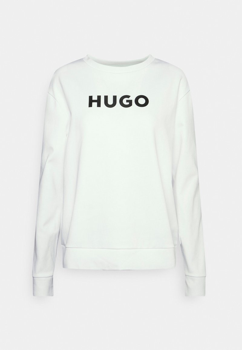 Bílá mikina s dlouhými rukávy, kulatým výstřihem a černým logem "HUGO" na hrudi. Vyrobena z měkké bavlny.