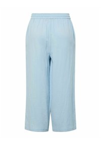 Pantalon large bleu clair avec ceinture élastique, fabriqué en tissu texturé, présenté sur un fond blanc.