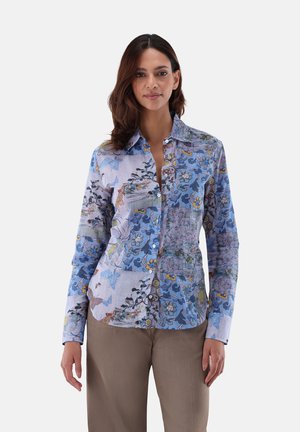 Button-up shirt in lightweight fabric, featuring a colorful floral and abstract pattern in shades of blue and lilac. Long sleeves with cuffs.